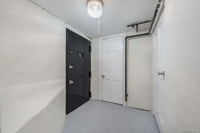 a view of a hallway with closet