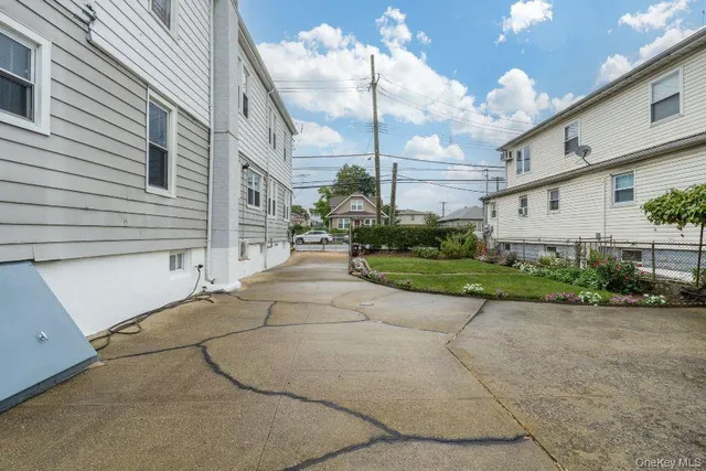 a view of a house with a street