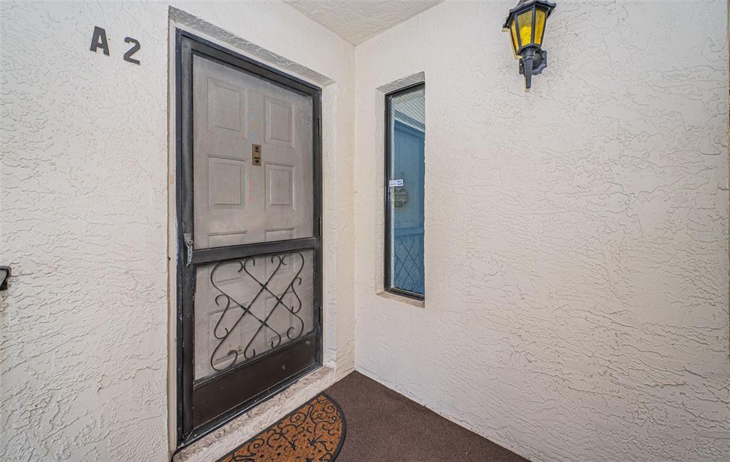 2522 Pine Ridge Way South, Unit A2 Palm Harbor, FL 34684 - Photo 4 of 34 a view of an entryway