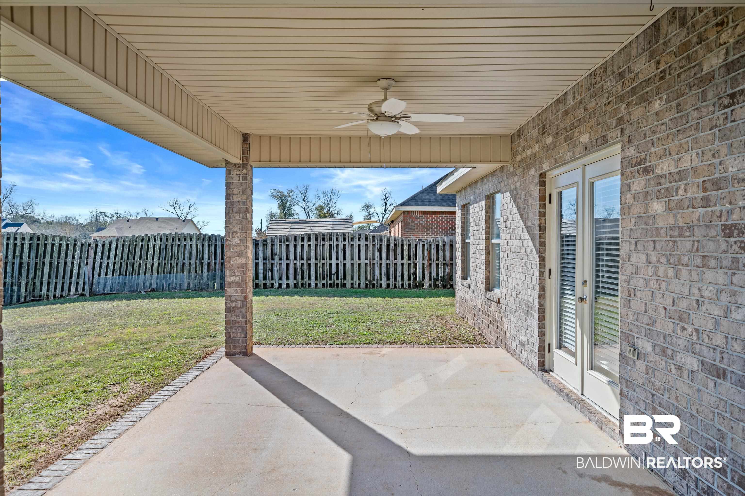 25350 Spindle Lane Daphne, AL 36526 - Photo 29 of 32 View of patio / terrace with ceiling fan and french doors