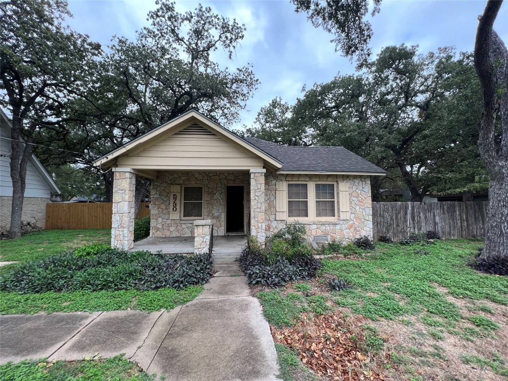 5722 Manor Road Austin, TX 78723 - Photo 9 of 16 a front view of a house with garden
