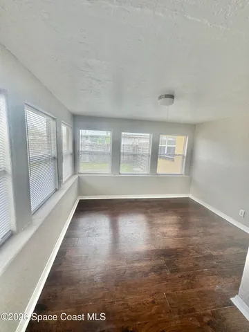 a view of entryway with white door