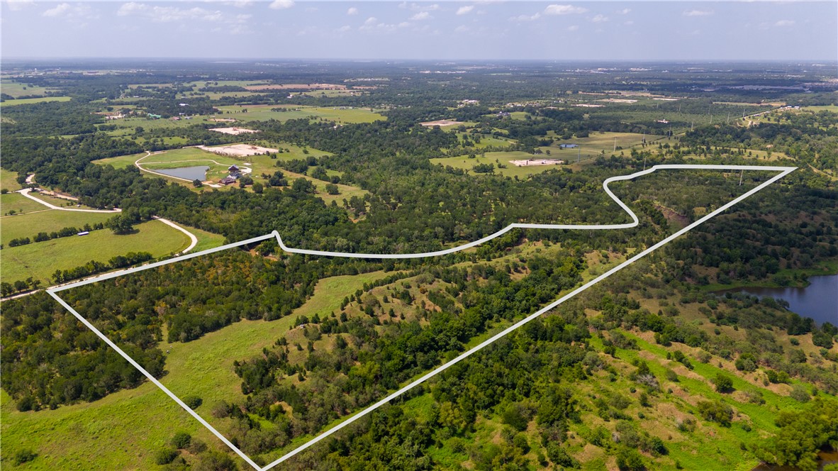 Tbd Leonard Road Bryan, TX 77807 - Photo 2 of 24 a view of a city from a balcony