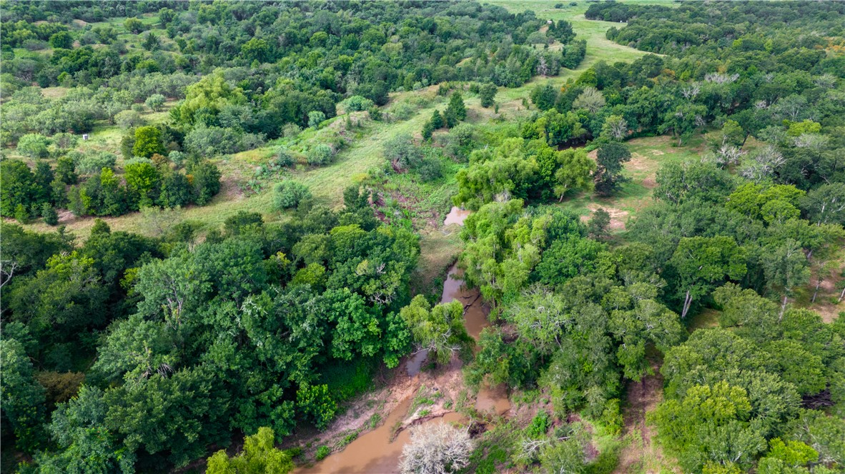Tbd Leonard Road Bryan, TX 77807 - Photo 23 of 24 an aerial view of residential house with outdoor space and trees all around