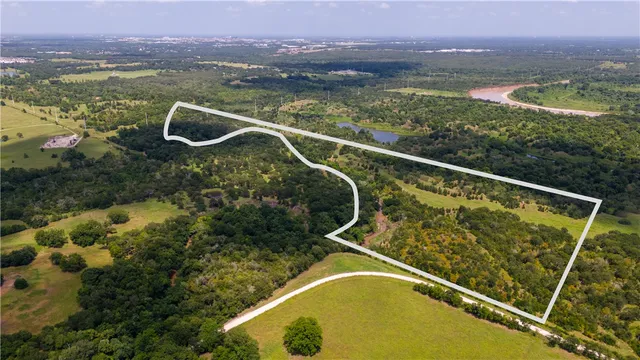 a view of a swimming pool with a balcony