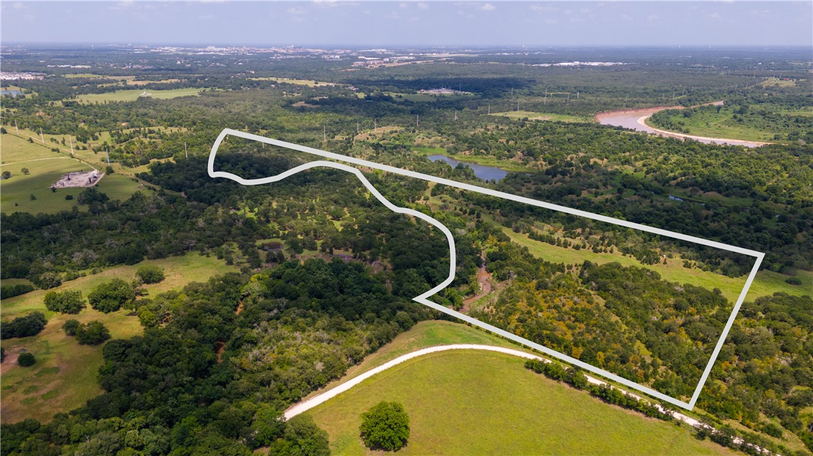 Tbd Leonard Road Bryan, TX 77807 - Photo 3 of 24 a view of a swimming pool with a balcony