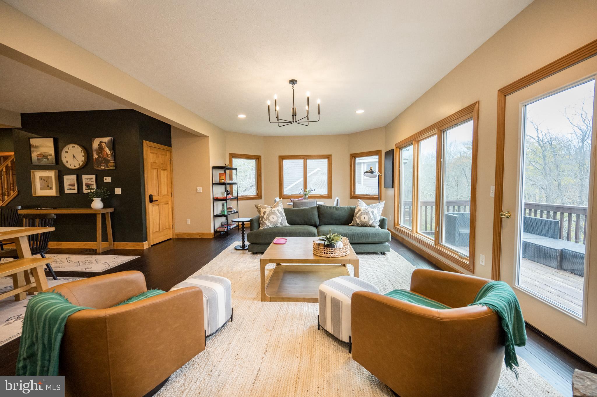 147 Marsh Hill Road McHenry, MD 21541 - Photo 18 of 60 a living room with furniture ceiling fan and a window