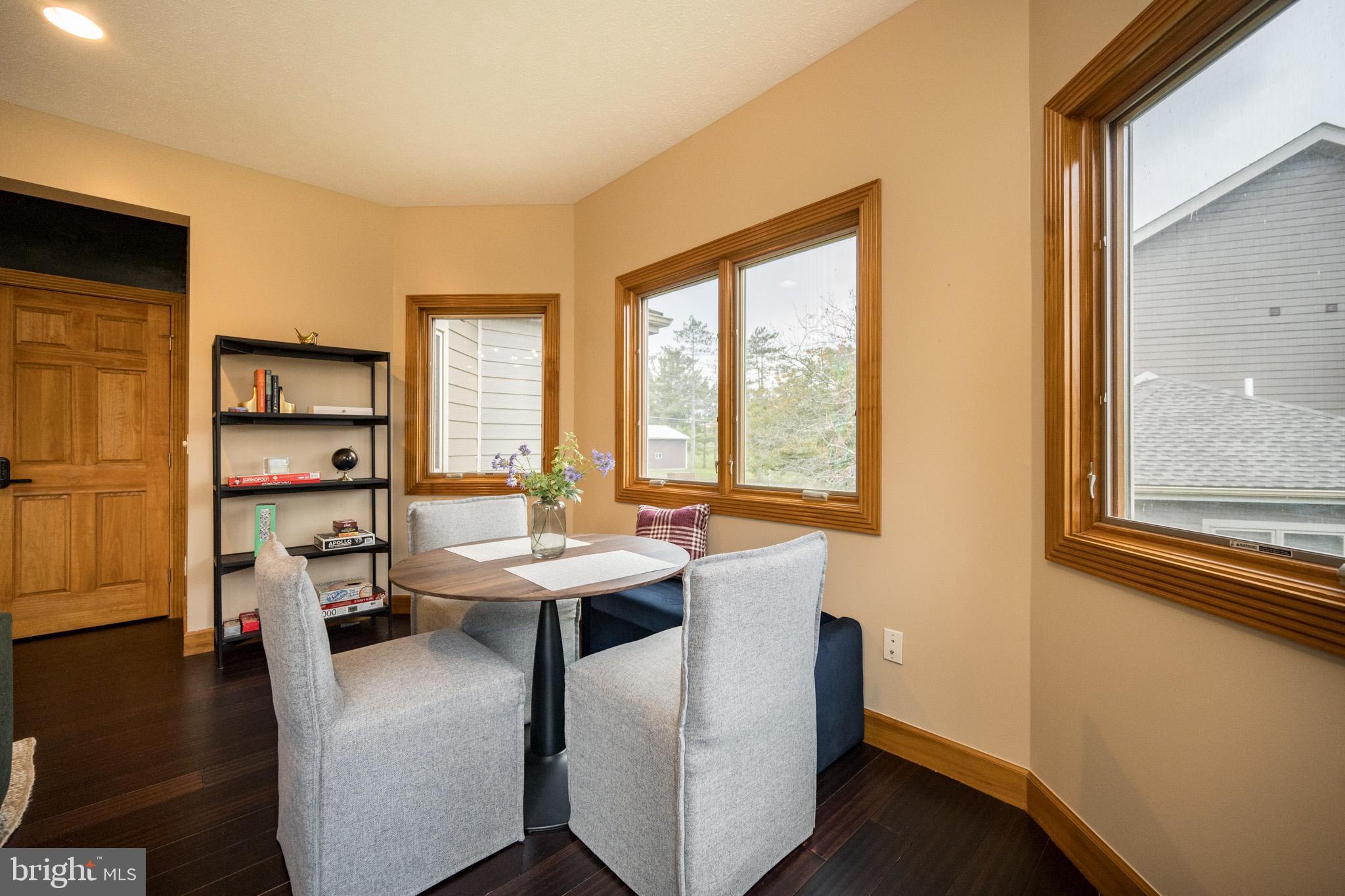 147 Marsh Hill Road McHenry, MD 21541 - Photo 20 of 60 a view of a dining room with furniture window and wooden floor