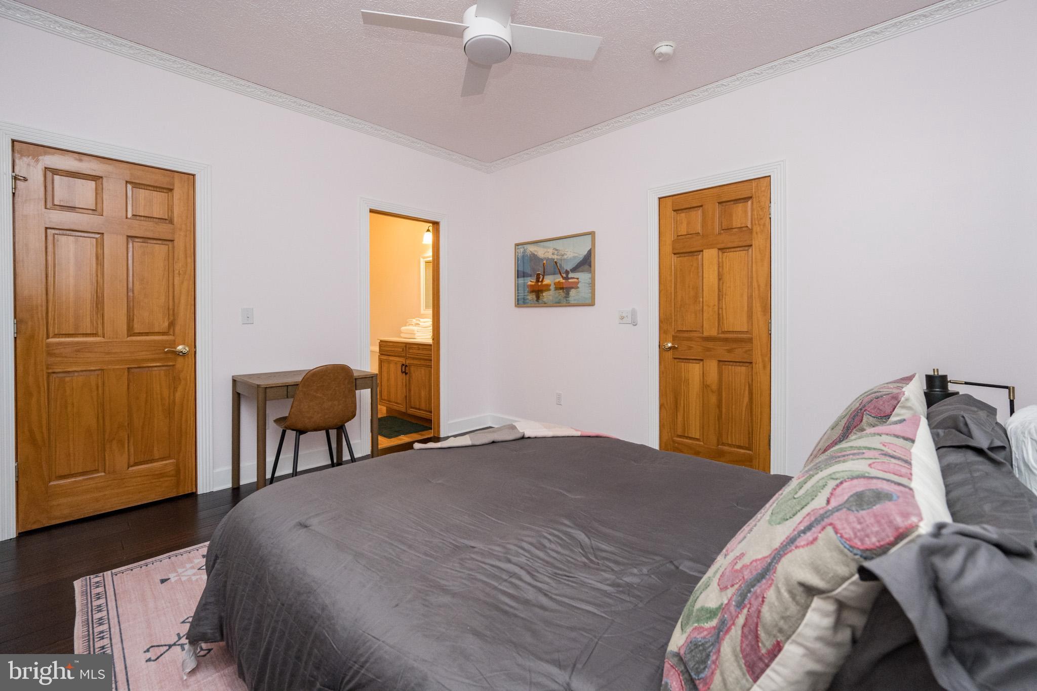 147 Marsh Hill Road McHenry, MD 21541 - Photo 22 of 60 a bedroom with a bed and a table