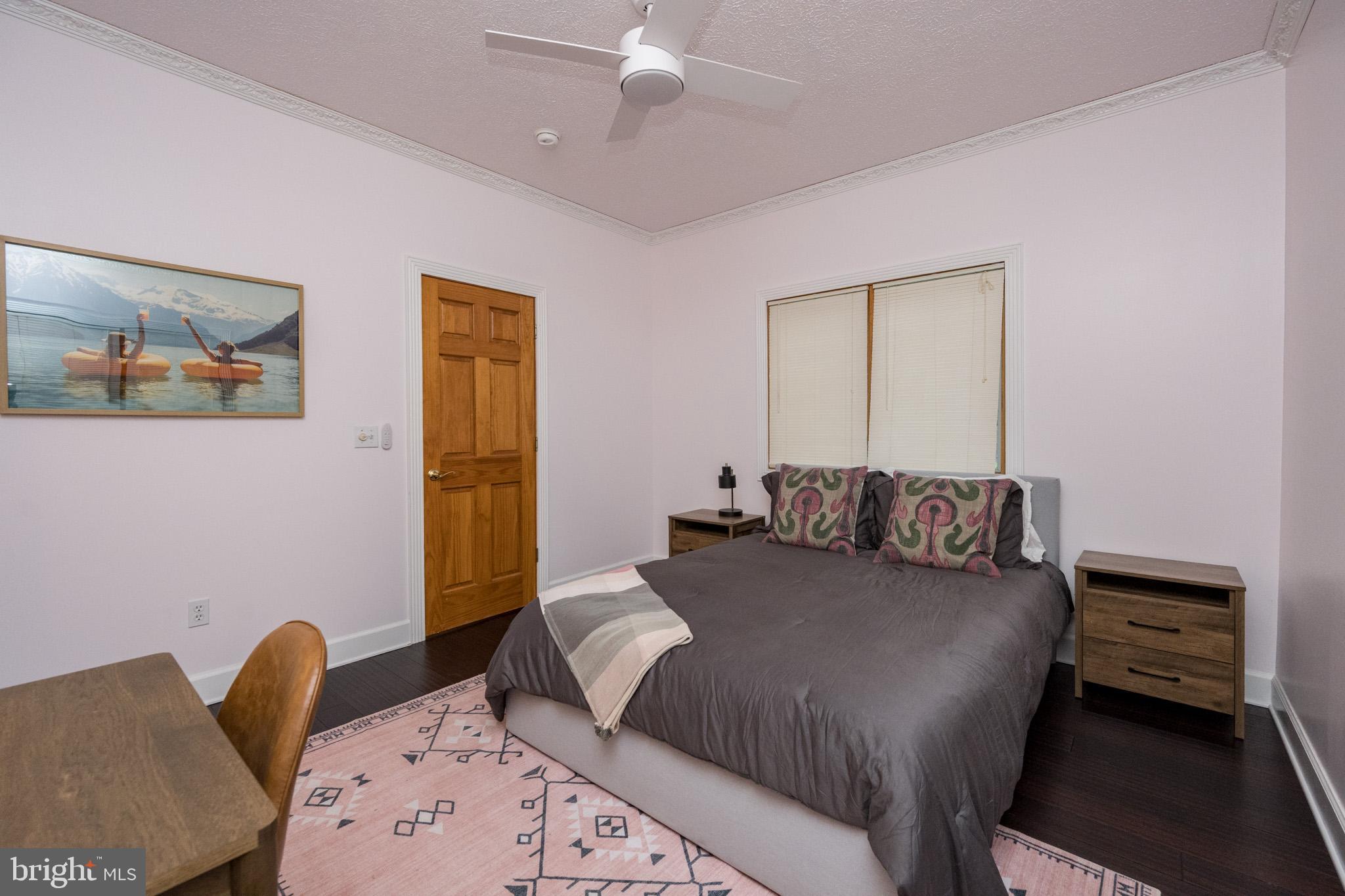 147 Marsh Hill Road McHenry, MD 21541 - Photo 23 of 60 a bedroom with a bed and a couch