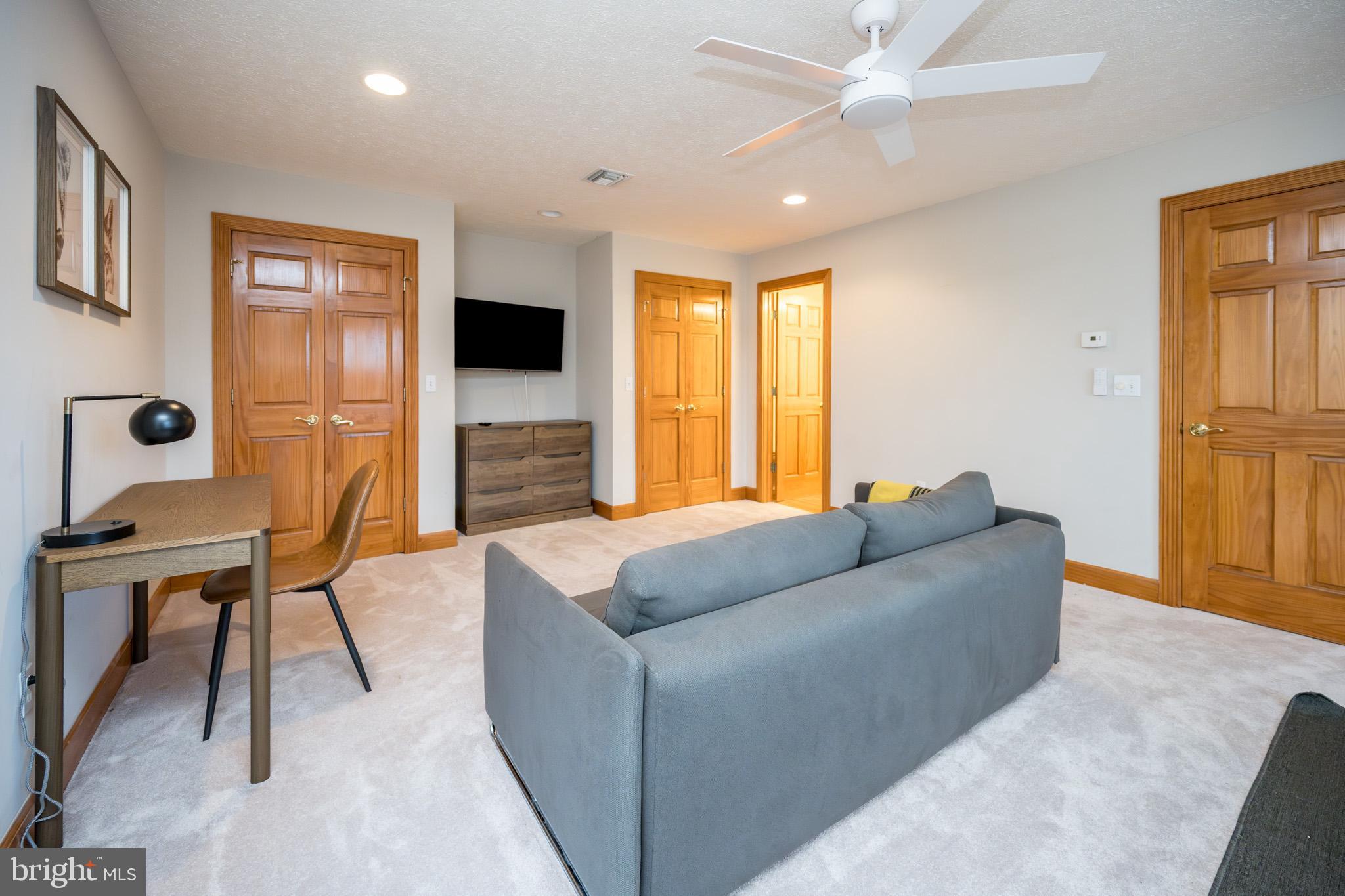 147 Marsh Hill Road McHenry, MD 21541 - Photo 29 of 60 a living room with furniture and a flat screen tv