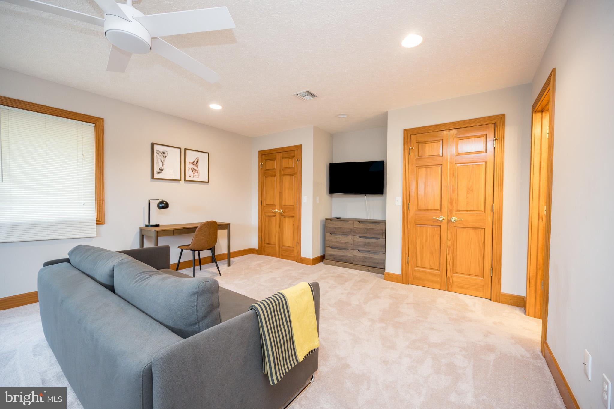 147 Marsh Hill Road McHenry, MD 21541 - Photo 30 of 60 a living room with furniture and a flat screen tv