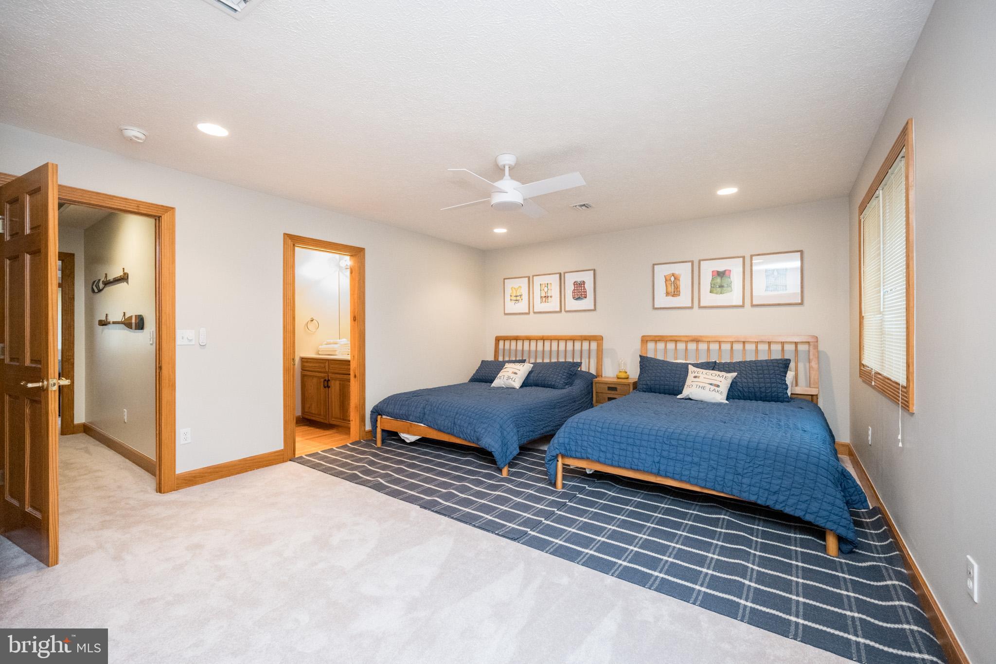 147 Marsh Hill Road McHenry, MD 21541 - Photo 33 of 60 a bedroom with furniture and a rug