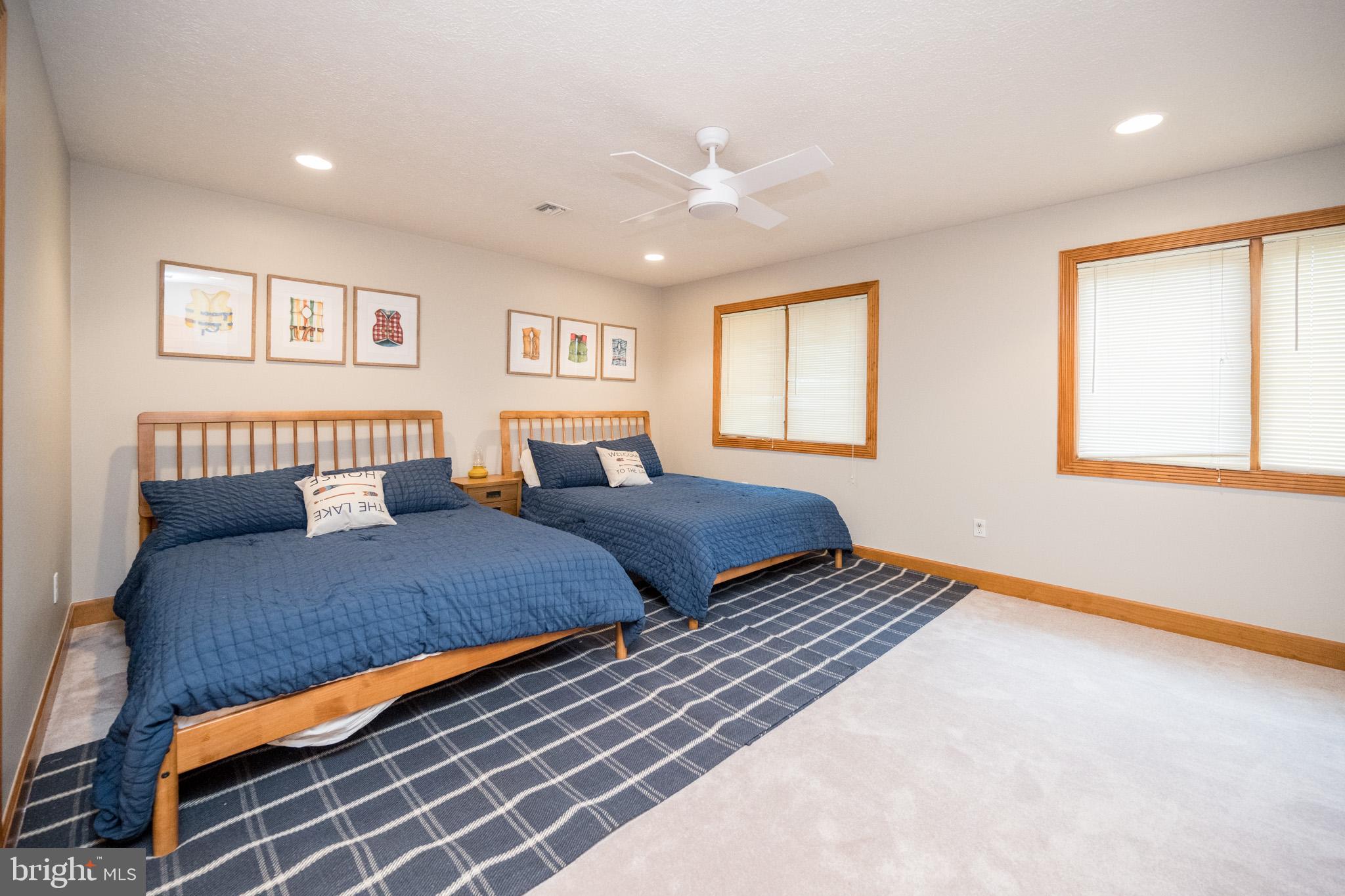 147 Marsh Hill Road McHenry, MD 21541 - Photo 34 of 60 a bedroom with a large bed and a window