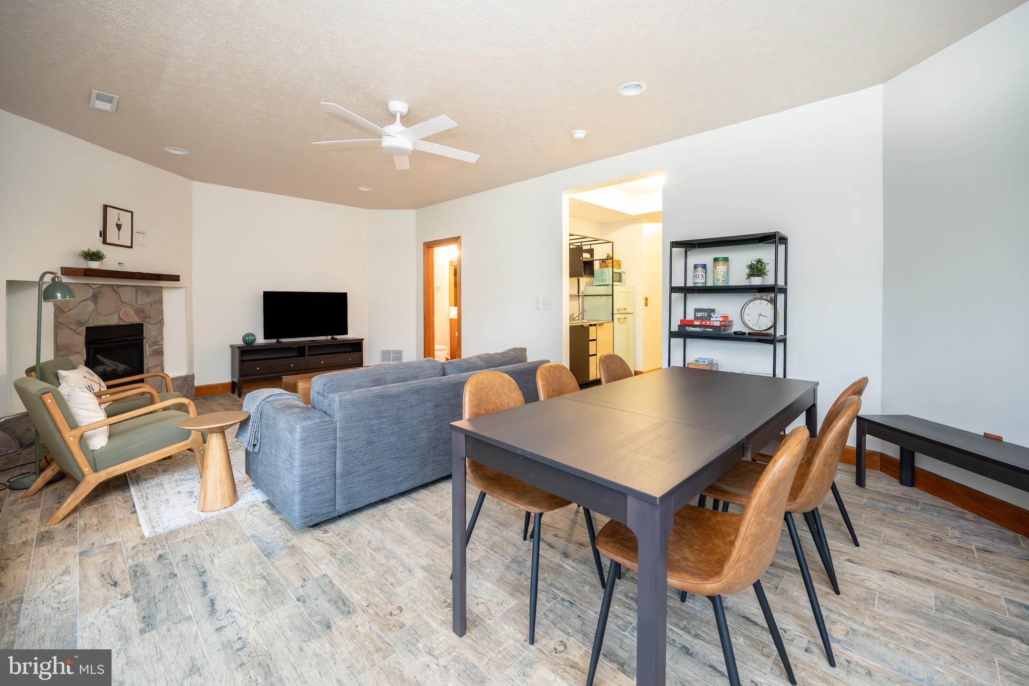 147 Marsh Hill Road McHenry, MD 21541 - Photo 40 of 60 a view of a livingroom with furniture and a flat screen tv