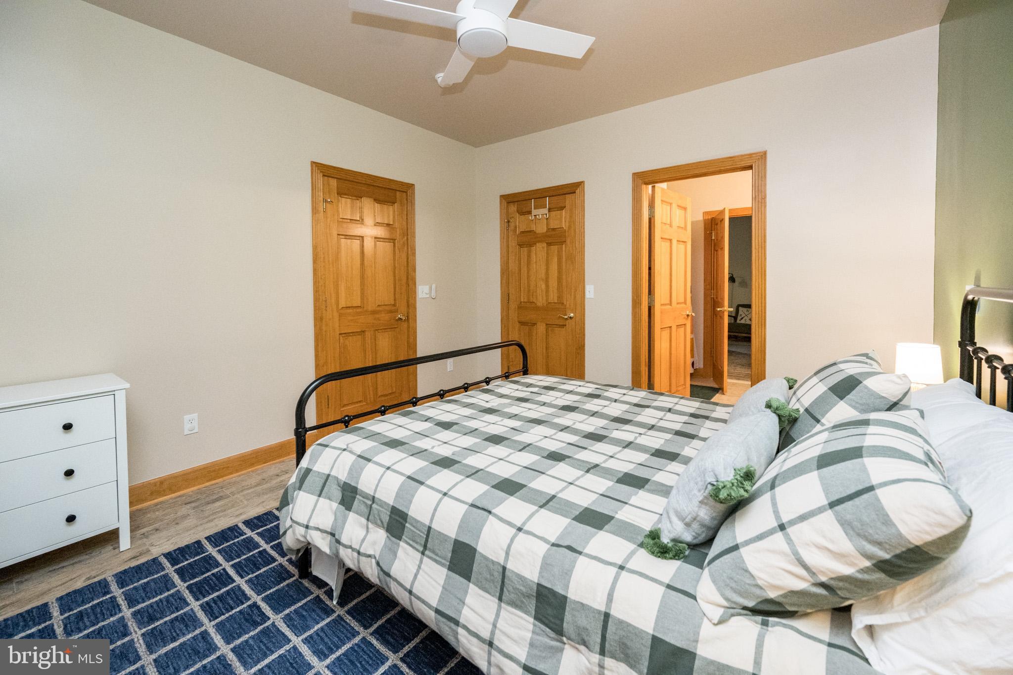 147 Marsh Hill Road McHenry, MD 21541 - Photo 48 of 60 a bedroom with a bed and a window