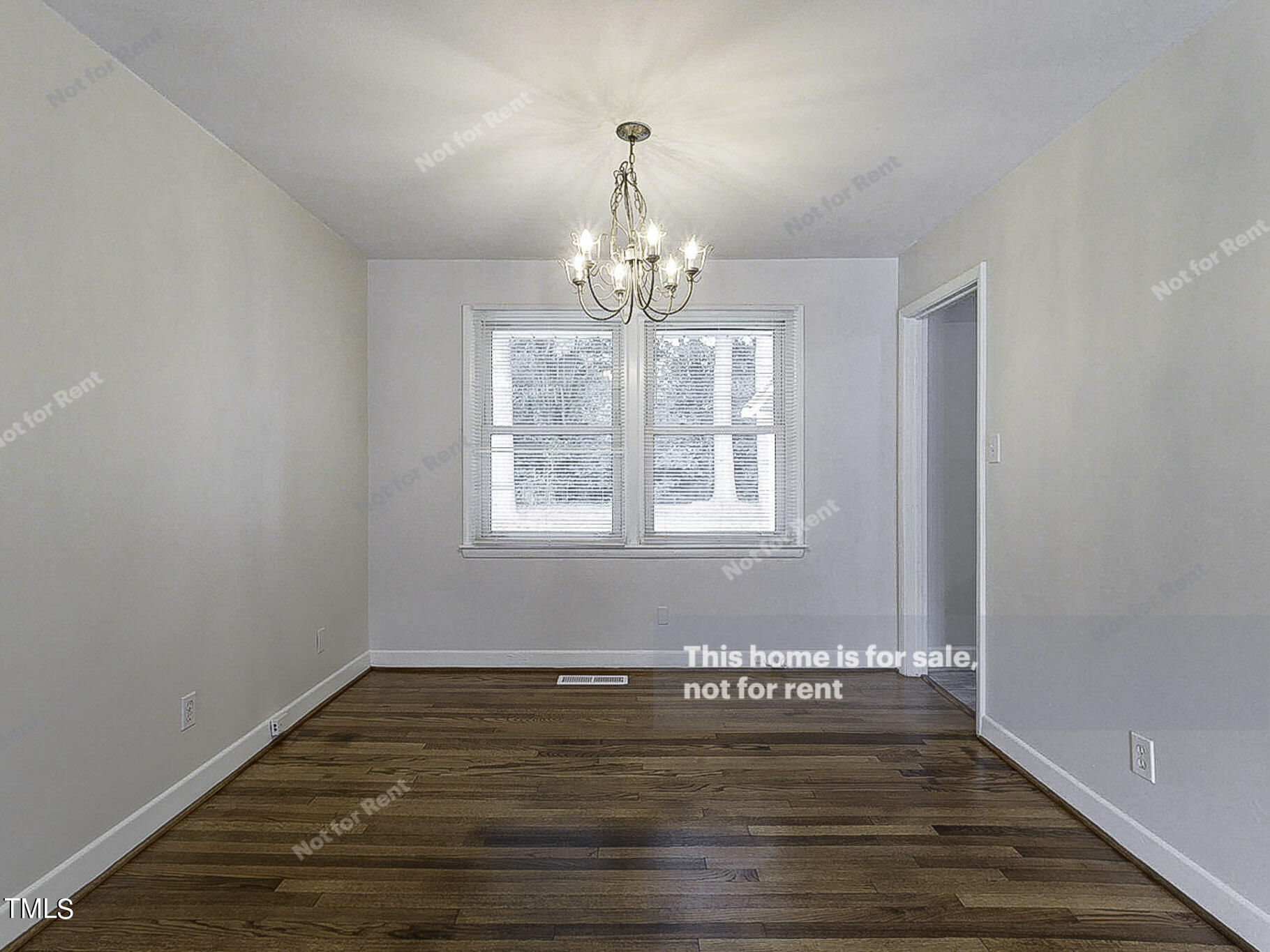 3413 Wade Avenue Raleigh, NC 27607 - Photo 11 of 24 a view of empty room with wooden floor and fan