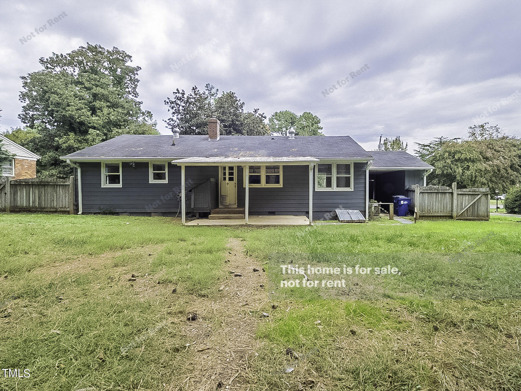 3413 Wade Avenue Raleigh, NC 27607 - Photo 8 of 24 front view of a house with a yard