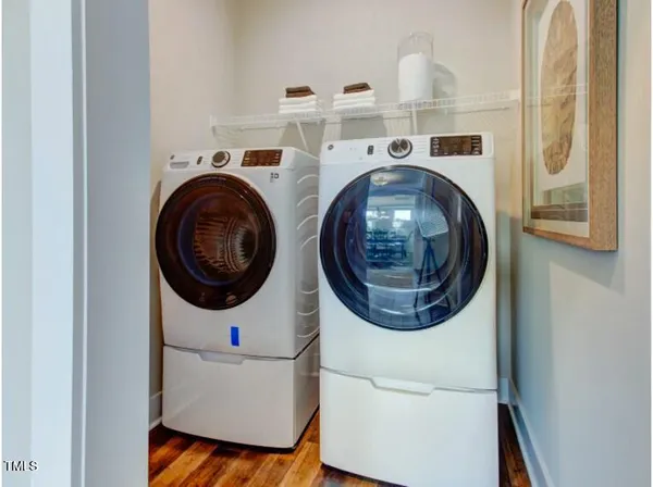 a utility room with dryer and washer