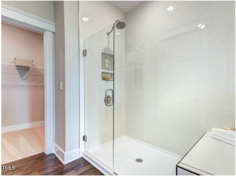 0 Boykin Road Sims, NC 27880 - Photo 28 of 48 a bathroom with a shower and a glass door