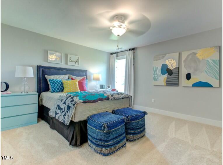 0 Boykin Road Sims, NC 27880 - Photo 38 of 48 a bedroom with a bed and ceiling fan