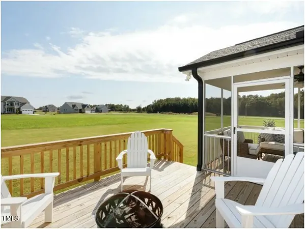 a view of a balcony with lake view and mountain view