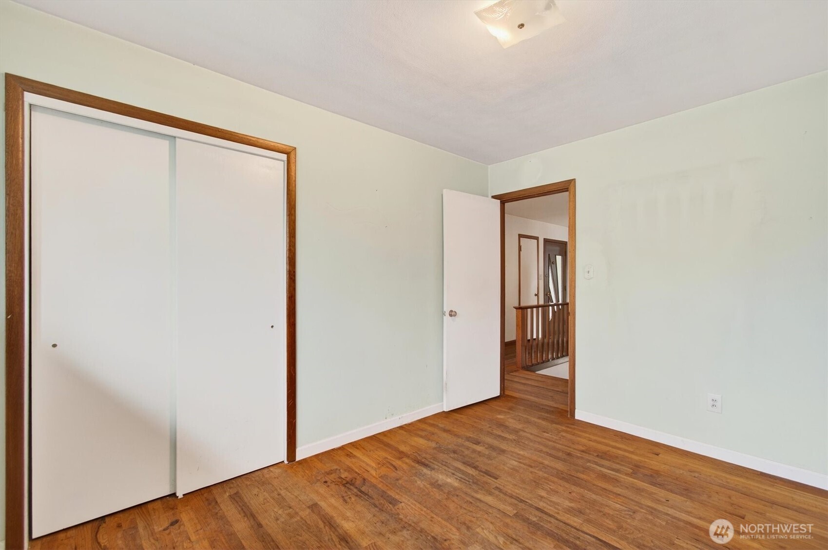 919 Cascade Drive Longview, WA 98632 - Photo 13 of 31 a view of an empty room with wooden floor