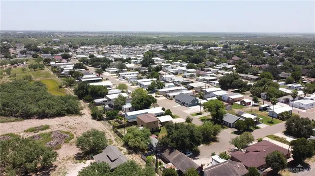 an aerial view of a city with lots of residential buildings