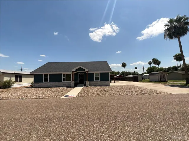 a view of a house with a patio