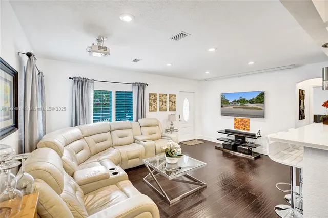 a bedroom with bed and window