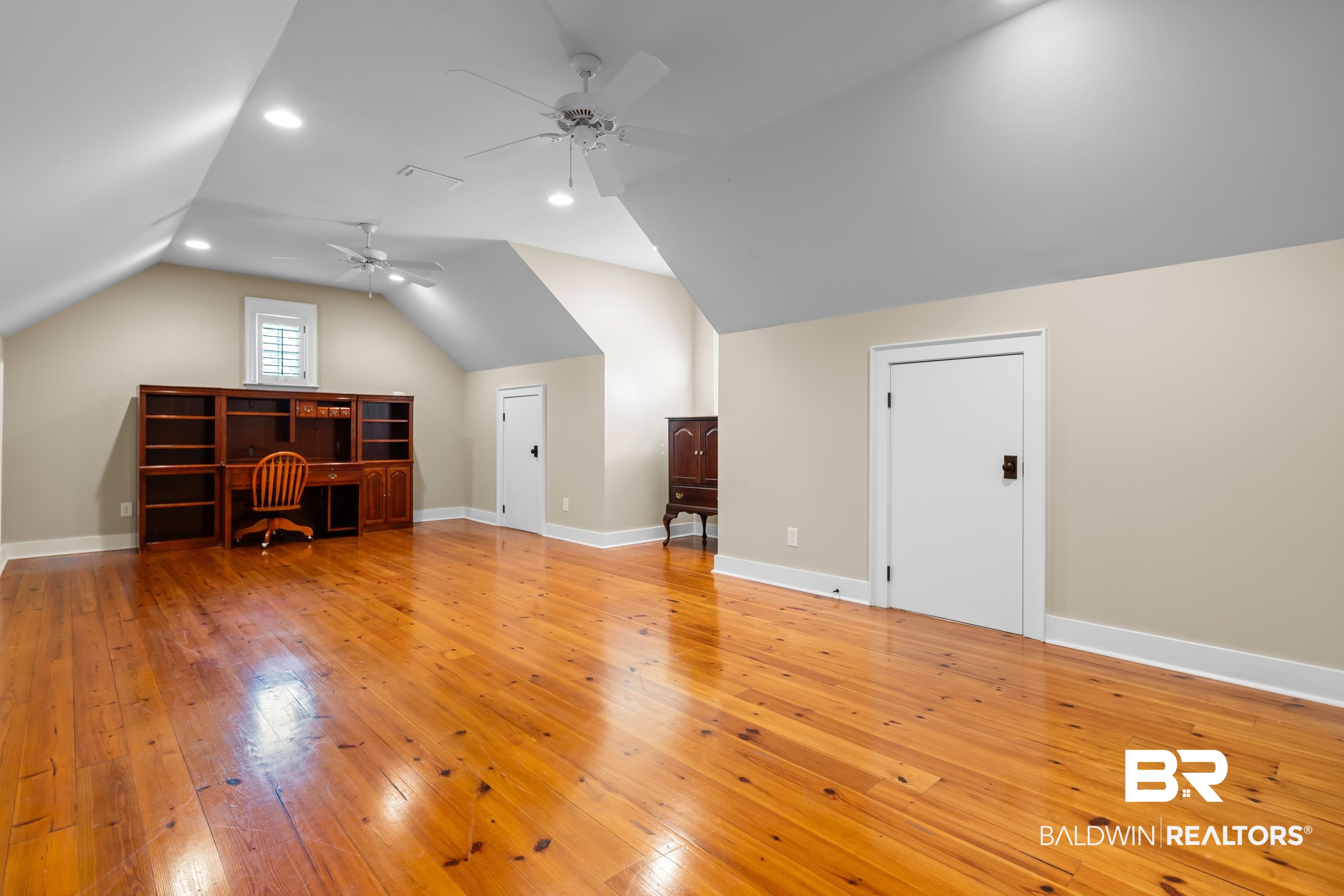 30057 Dolive Ridge Daphne, AL 36527 - Photo 34 of 55 Bonus room featuring vaulted ceiling, ceiling fan, and light hardwood / wood-style flooring