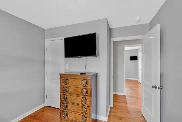 a view of a livingroom with a flat screen tv