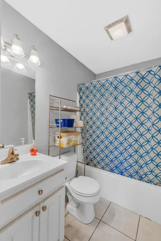 a bathroom with a toilet and a sink