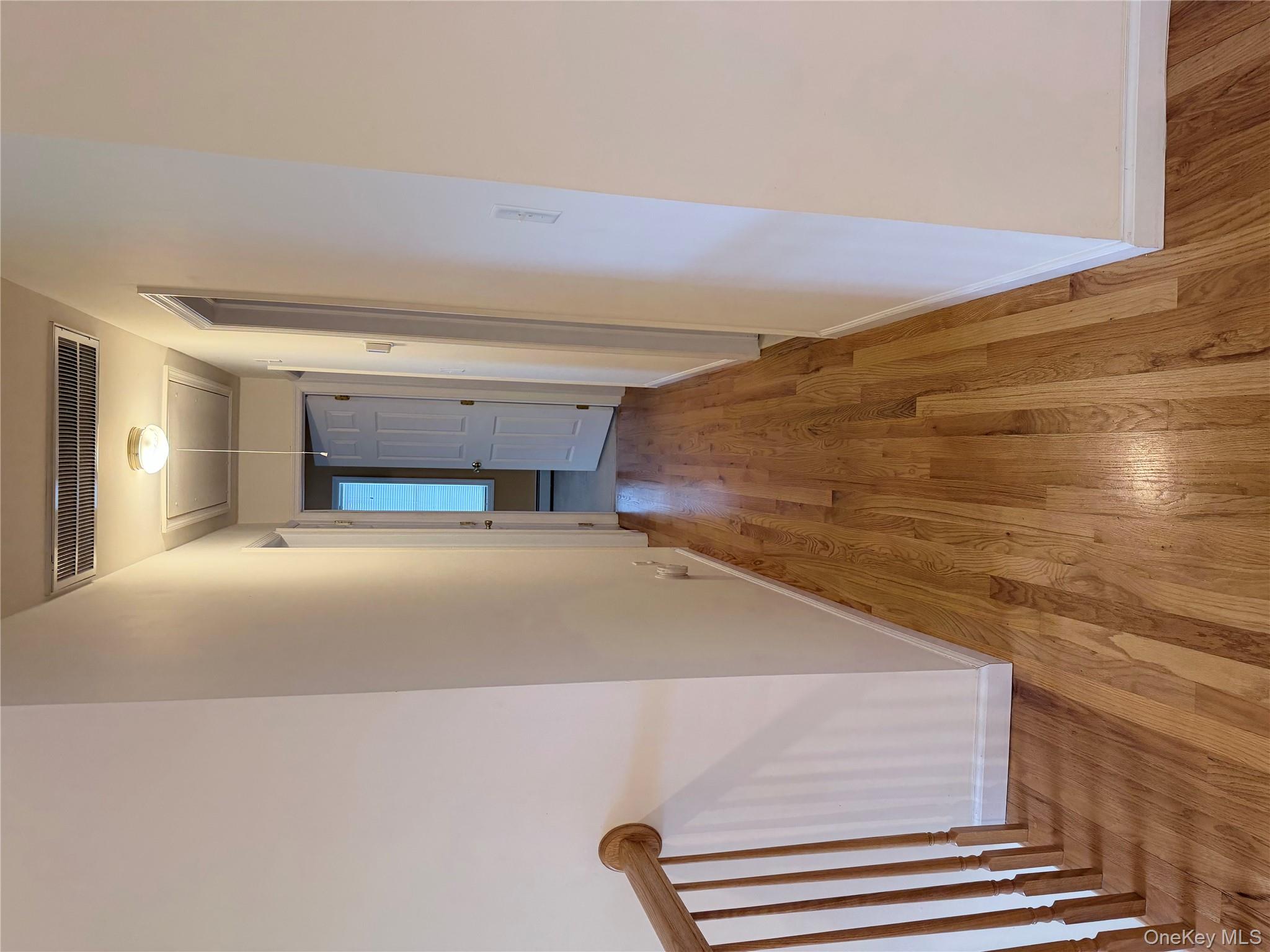 1043 Roosa Gap Road Pine Bush, NY 12566 - Photo 15 of 20 Hallway featuring attic access and light wood finished floors