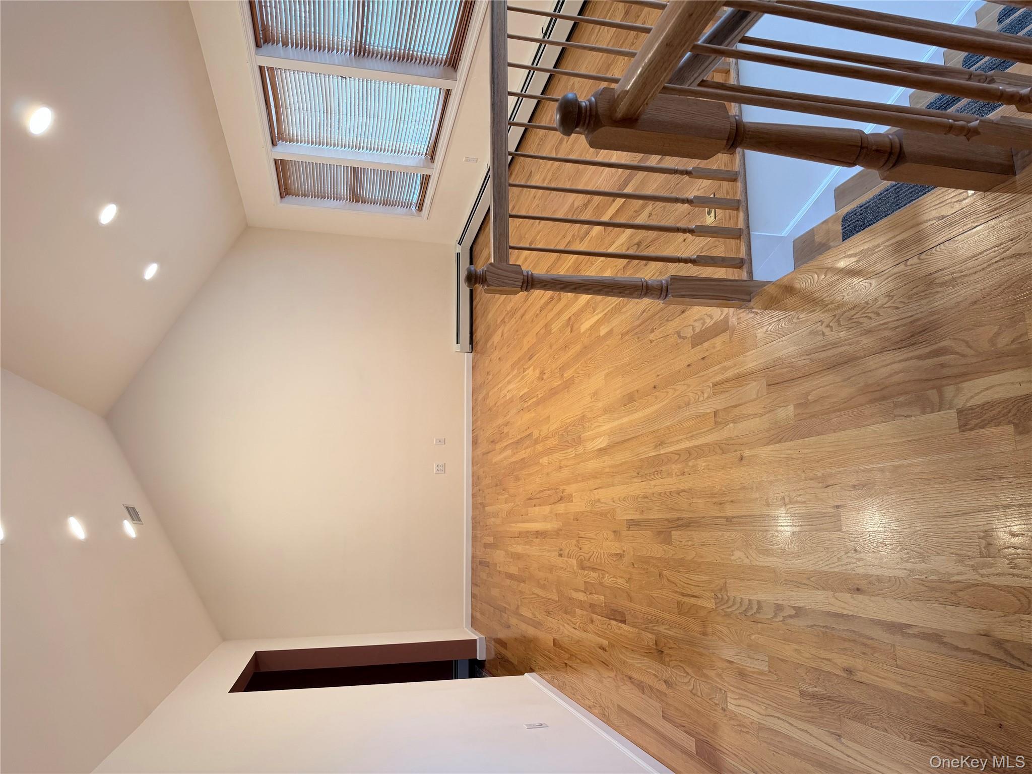 1043 Roosa Gap Road Pine Bush, NY 12566 - Photo 16 of 20 Spare room featuring vaulted ceiling, light wood-style flooring, recessed lighting, and a baseboard radiator