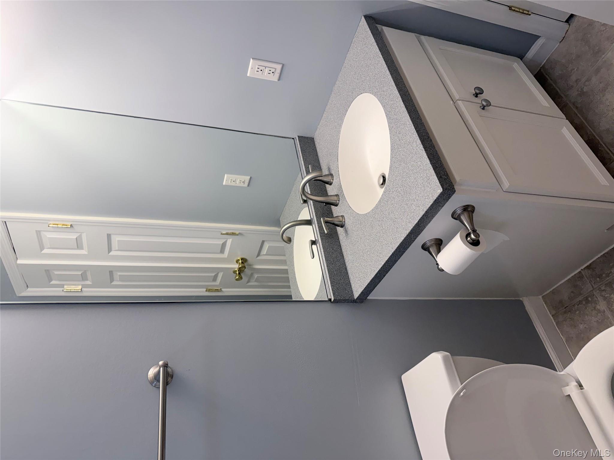 1043 Roosa Gap Road Pine Bush, NY 12566 - Photo 18 of 20 Half bathroom with vanity and tile patterned floors