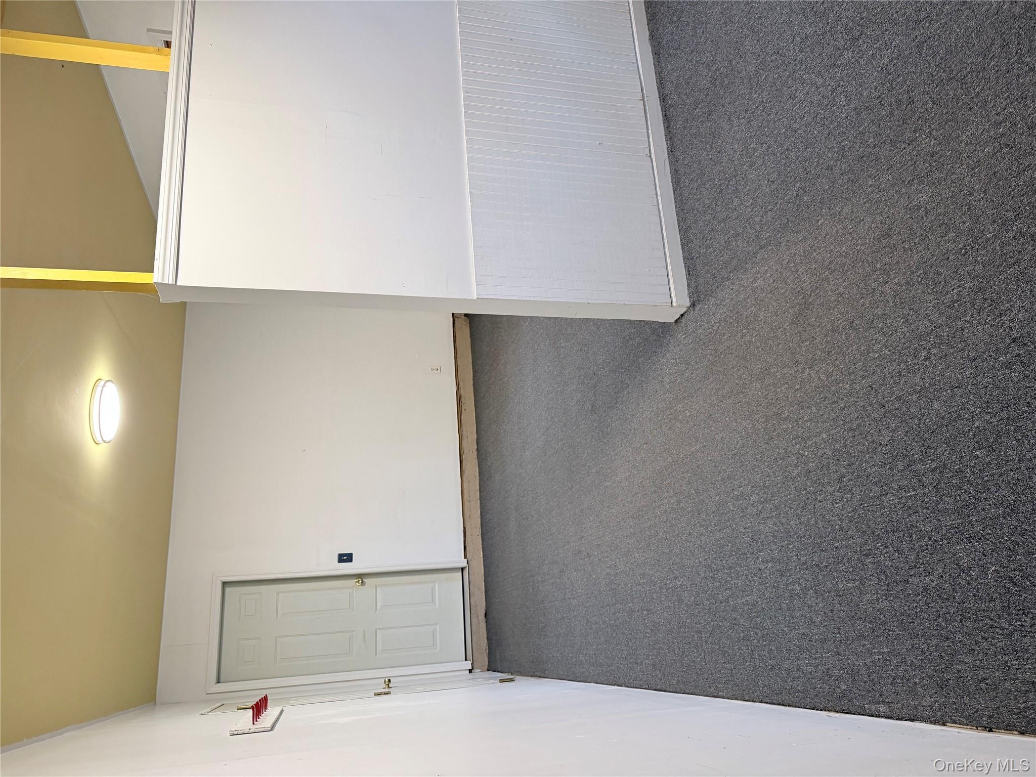 1043 Roosa Gap Road Pine Bush, NY 12566 - Photo 2 of 20 Spare room featuring dark colored carpet