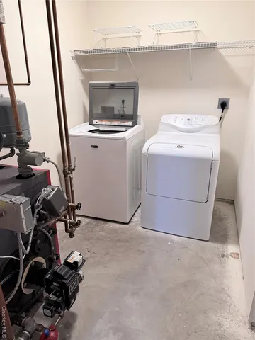 a utility room with a washer and dryer
