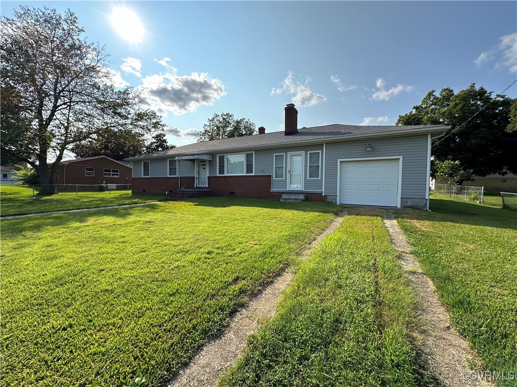 3415 Virginia Street Hopewell, VA 23860 - Photo 2 of 24 a view of a house with a yard and a large tree
