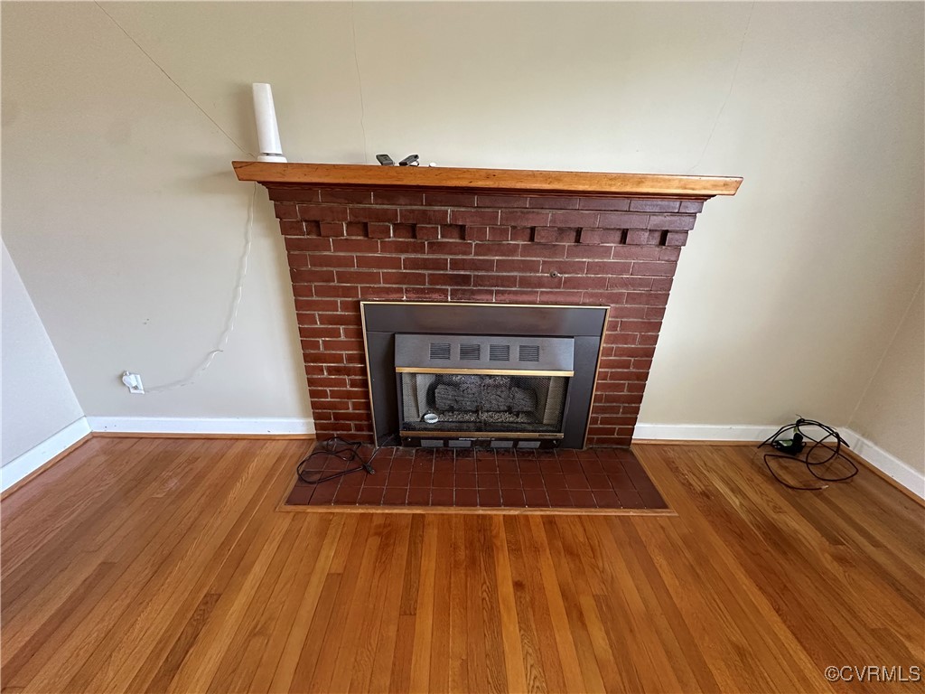 3415 Virginia Street Hopewell, VA 23860 - Photo 5 of 24 a living room with a fireplace