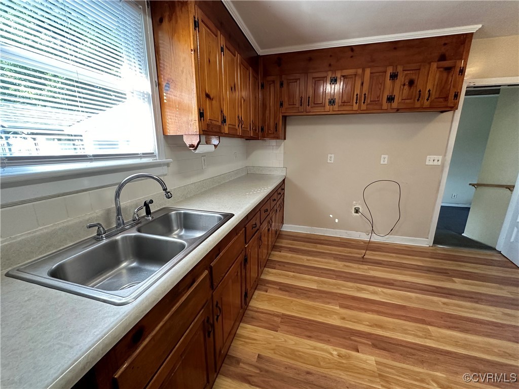 3415 Virginia Street Hopewell, VA 23860 - Photo 9 of 24 a kitchen with a sink and cabinets