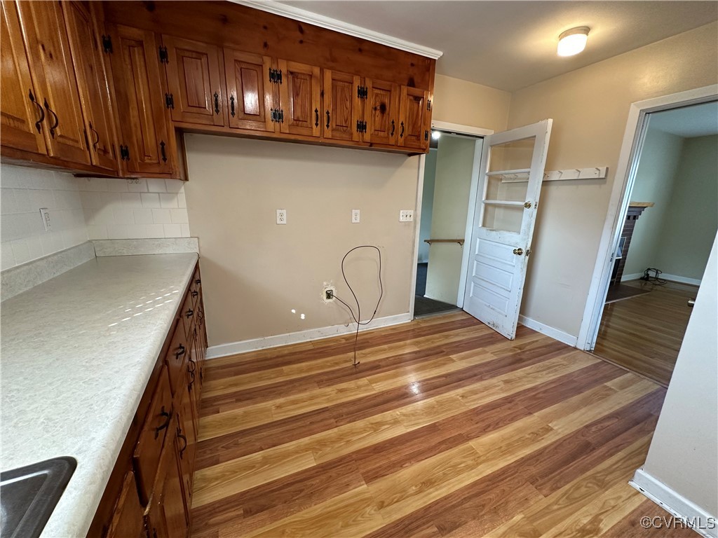 3415 Virginia Street Hopewell, VA 23860 - Photo 10 of 24 a view of a kitchen with refrigerator and cabinets