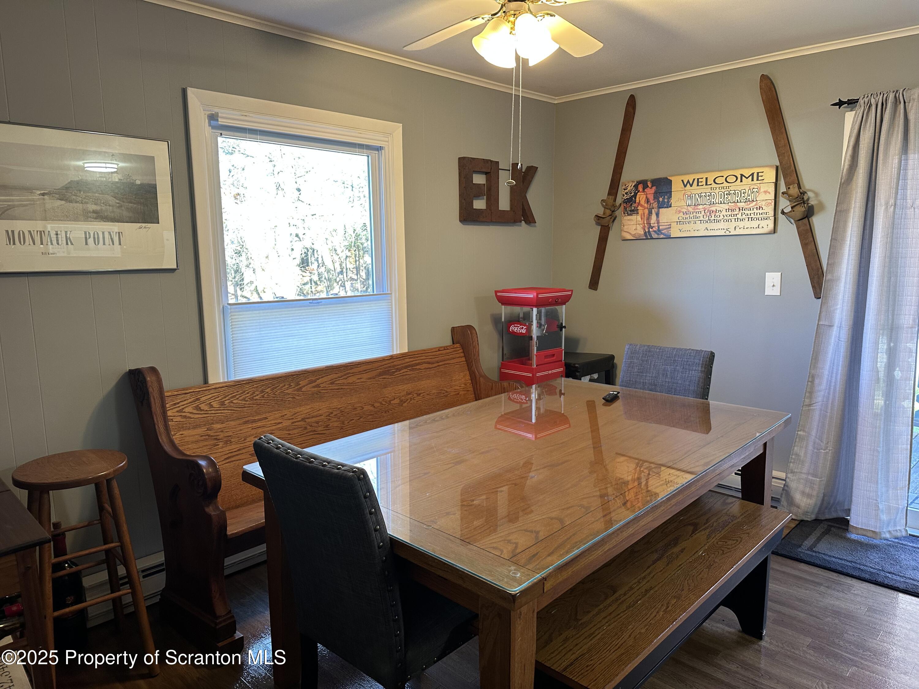 R-1 Ralph Lomma Way Union Dale, PA 18470 - Photo 17 of 25 a view of a dining room with furniture and wooden floor