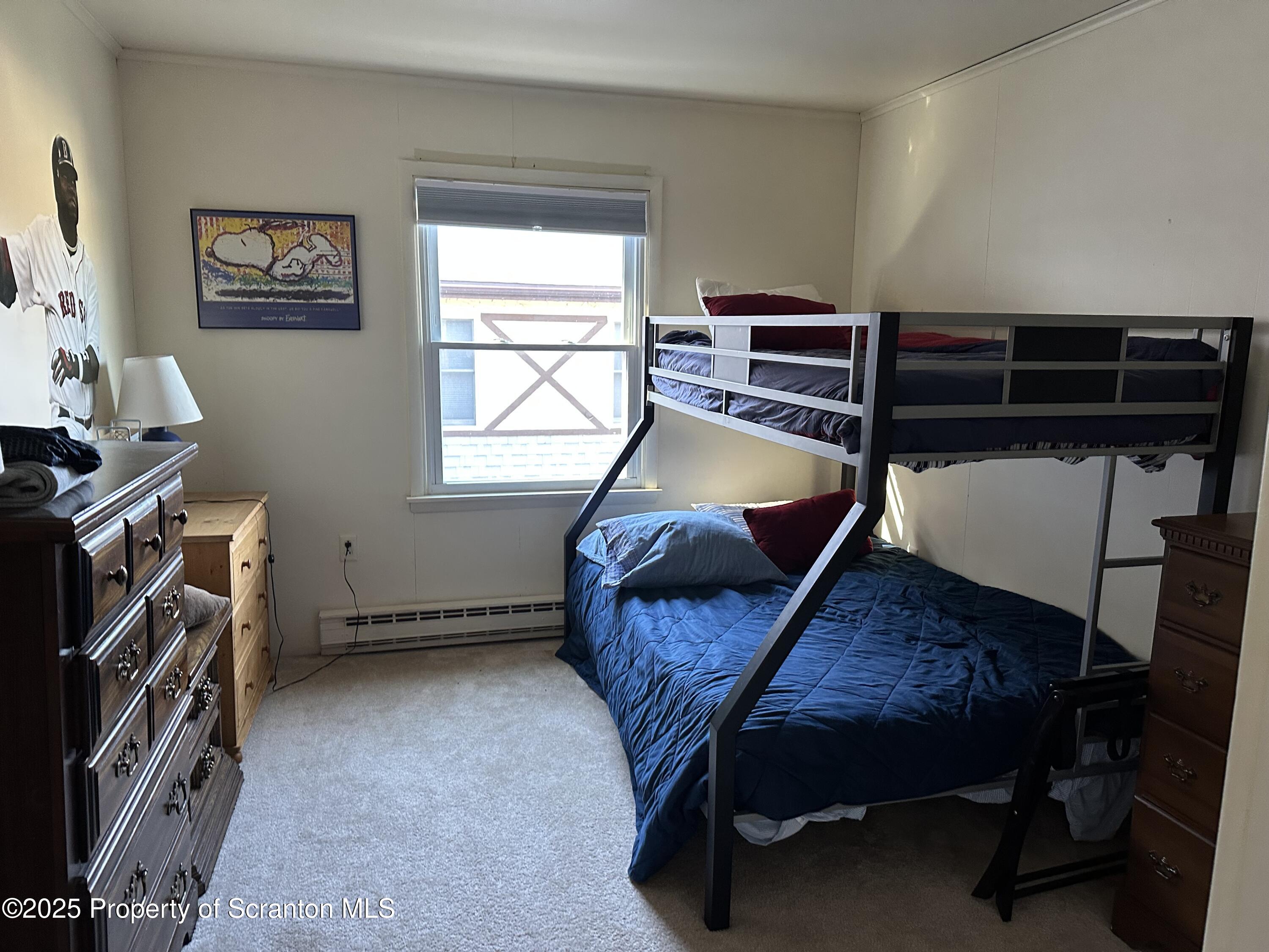 R-1 Ralph Lomma Way Union Dale, PA 18470 - Photo 19 of 25 a bedroom with furniture and a window