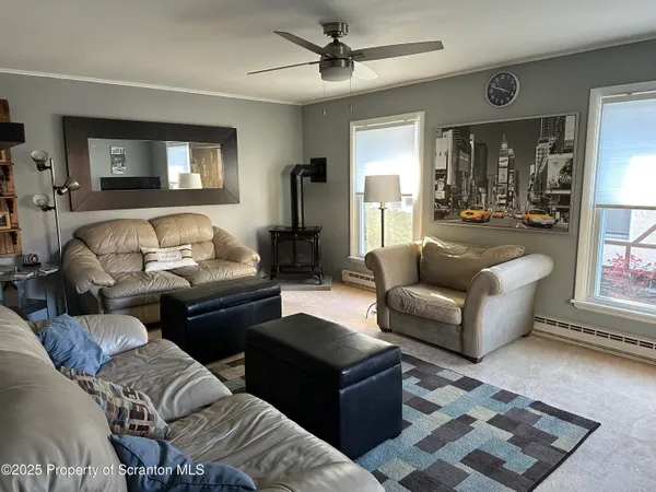 a living room with furniture and a window