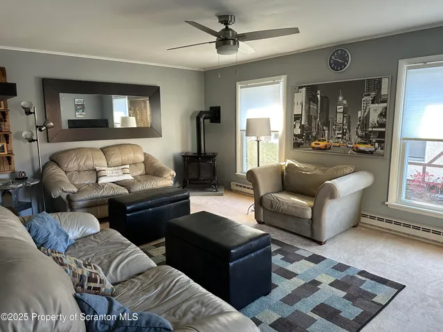 a living room with furniture and a window