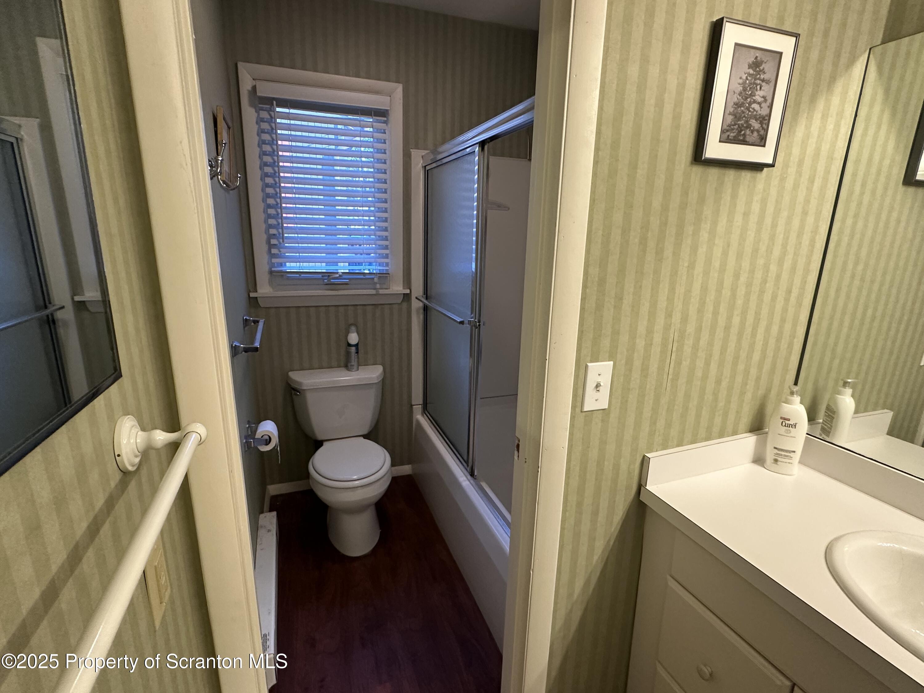 R-1 Ralph Lomma Way Union Dale, PA 18470 - Photo 21 of 25 a bathroom with a granite countertop toilet sink and a mirror