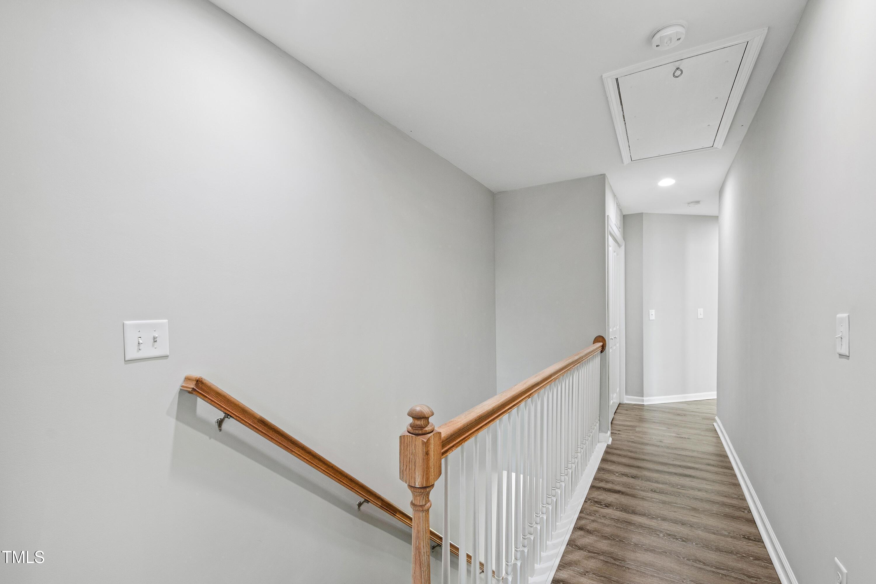 512 Spruce Street, Unit A Durham, NC 27703 - Photo 17 of 36 a view of a hallway with wooden floor