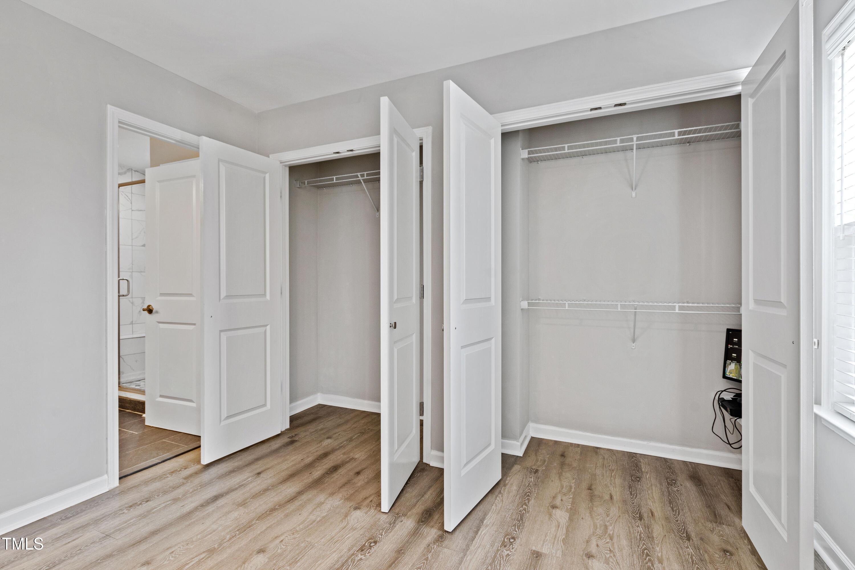 512 Spruce Street, Unit A Durham, NC 27703 - Photo 20 of 36 a view of empty room with wooden floor