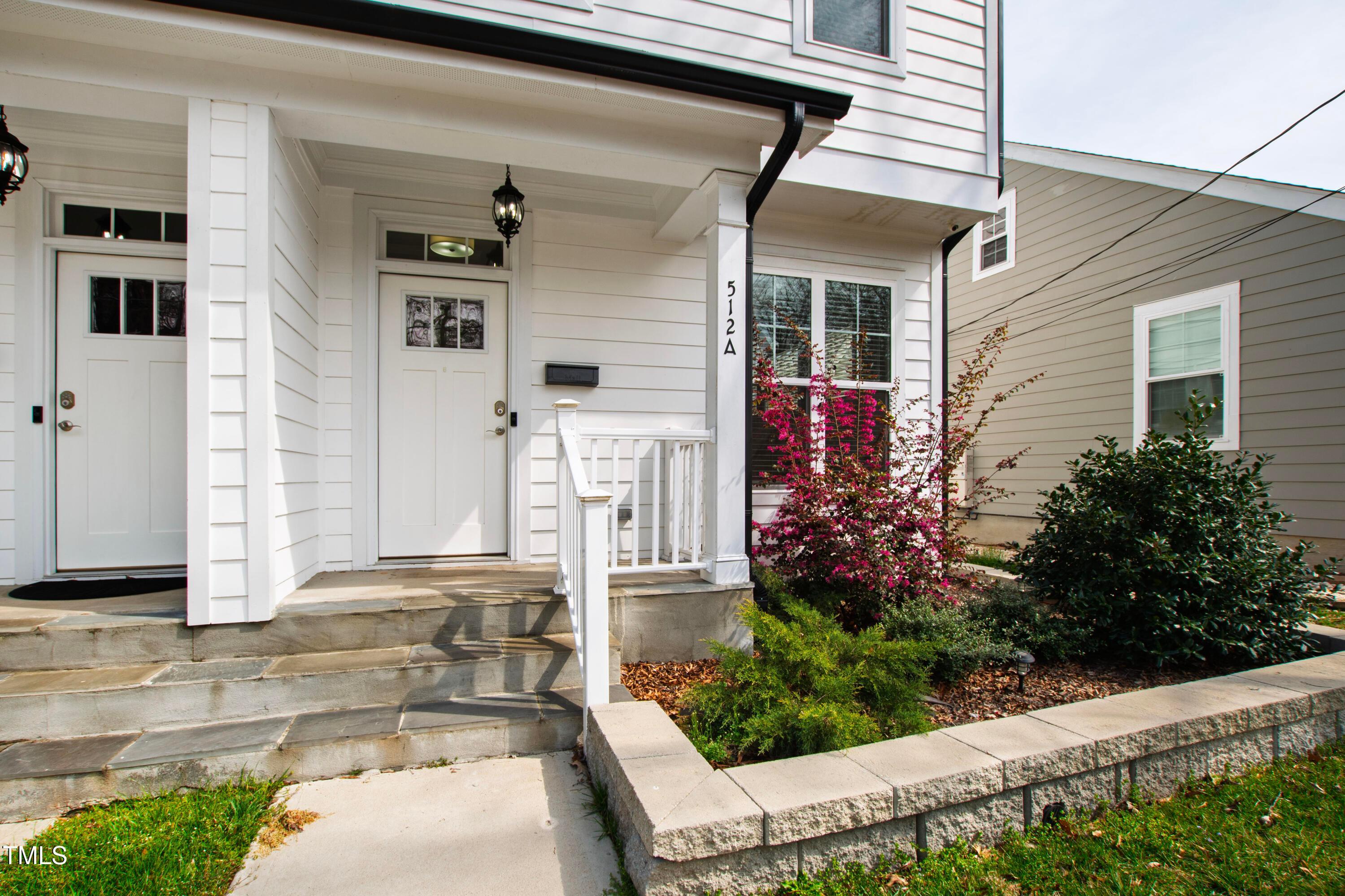 512 Spruce Street, Unit A Durham, NC 27703 - Photo 2 of 36 a front view of a house with garden